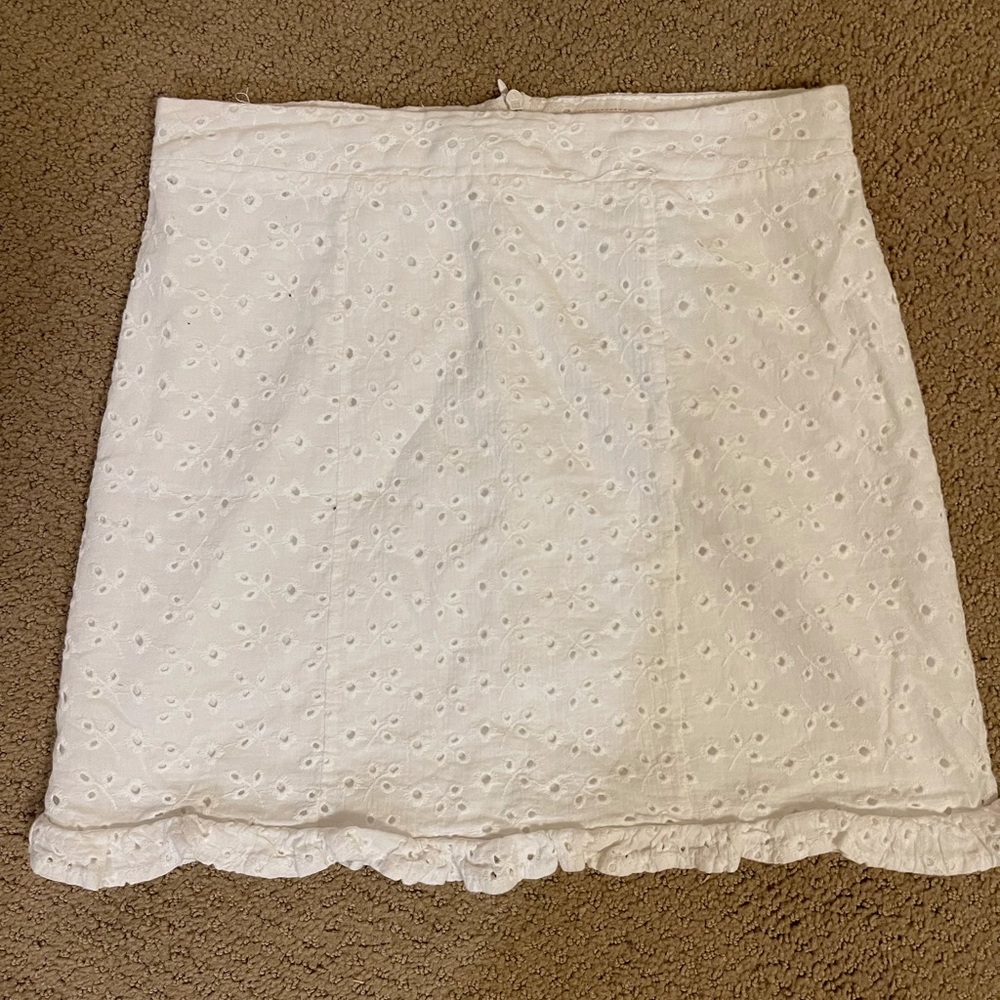 Mini white lace skirt